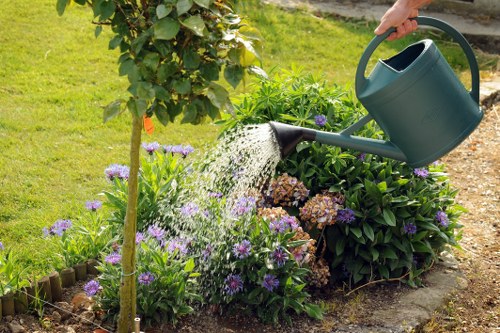 Green waste being moved to transfer station containers